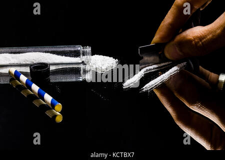 America`s drug epidemic has been brought heavily to light in recent years  and Cocaine ranks high among drugs used by many socioeconomic groups. Stock Photo